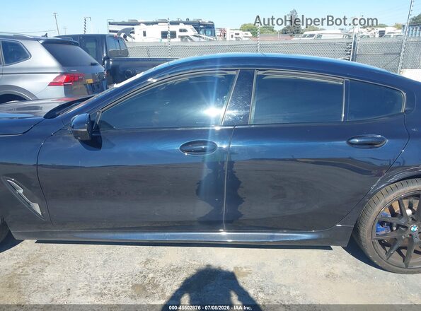 WBAGV2C09NCK07500 2022 BMW 8 SERIES Blue Vista interior trasera