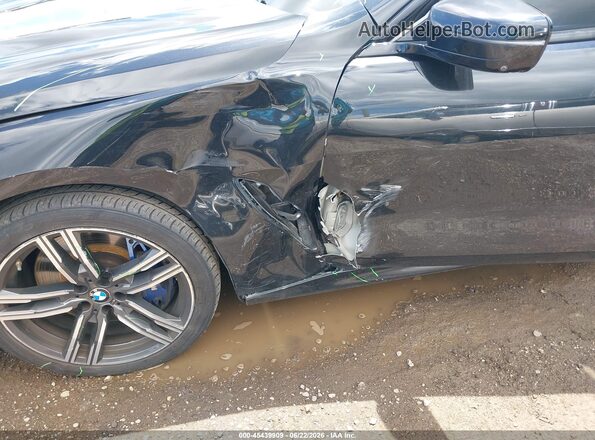 WBAGV4C01MCG46221 2021 BMW 8 SERIES Черный Вид спереди
