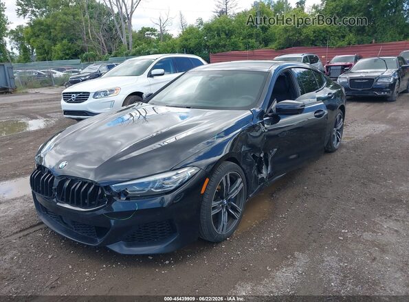 WBAGV4C01MCG46221 2021 BMW 8 SERIES Черный Передняя левая четверть