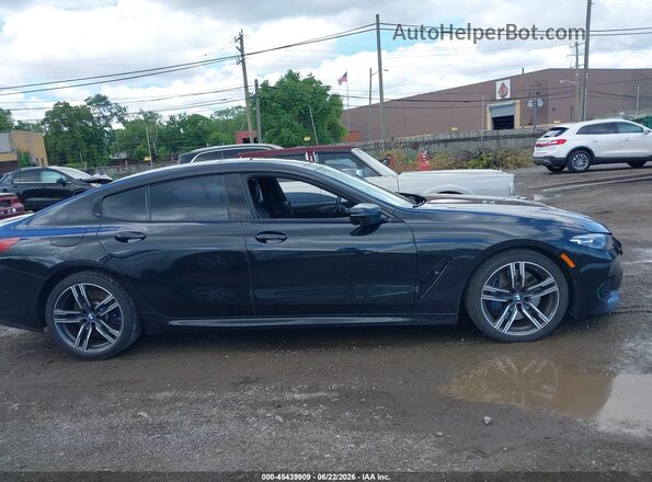 WBAGV4C01MCG46221 2021 BMW 8 SERIES Черный Вид задней части салона