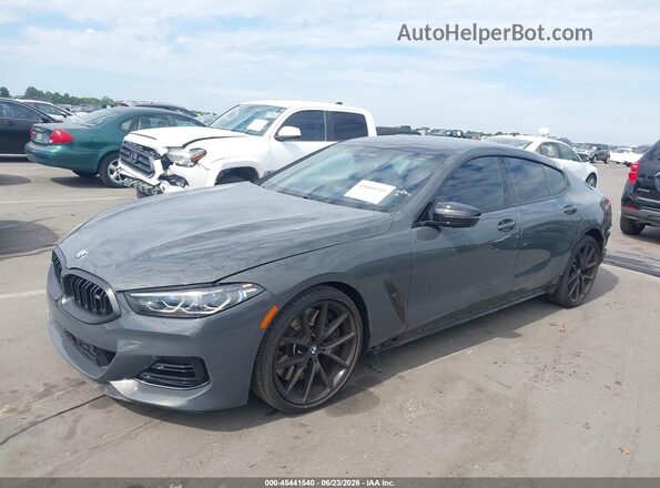 WBAGV8C00PCK75206 2023 BMW M8 Gray Front left