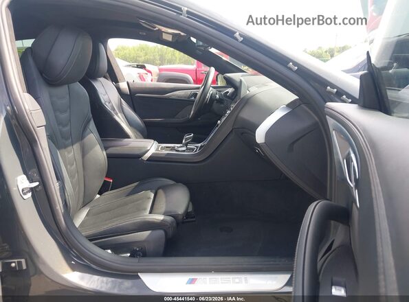 WBAGV8C00PCK75206 2023 BMW M8 Gray Front interior view