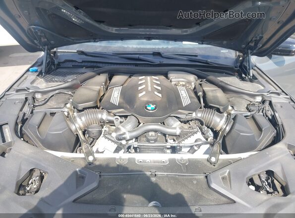 WBAGV8C00PCK75206 2023 BMW M8 Gray Rear view