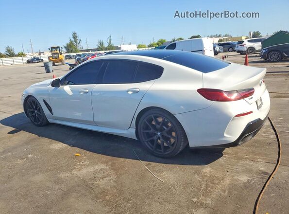 WBAGV8C01NCJ74706 2022 BMW M8 White Rear left