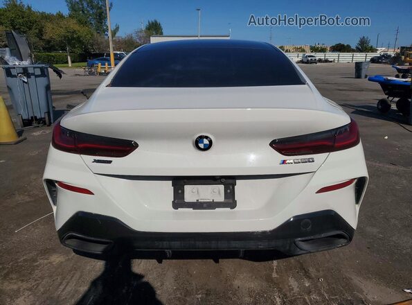 WBAGV8C01NCJ74706 2022 BMW M8 White Rear view