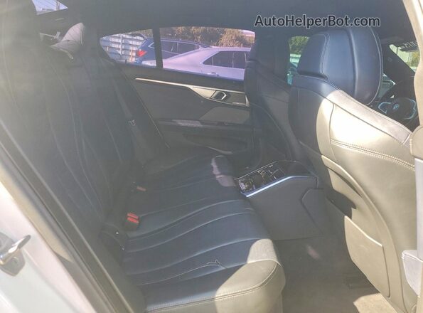 WBAGV8C01NCJ74706 2022 BMW M8 White Rear seats view