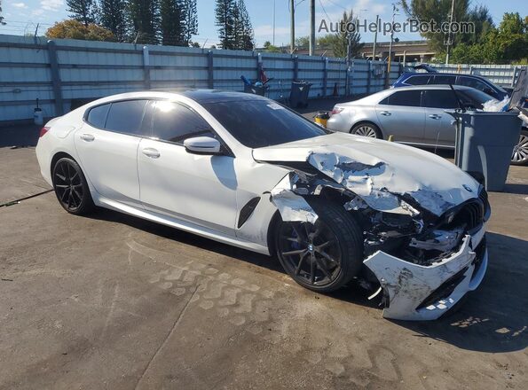 WBAGV8C01NCJ74706 2022 BMW M8 White Front right
