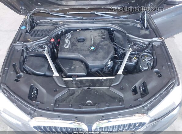 WBAJA5C54JWA57709 2018 BMW 7 SERIES Gray Rear view