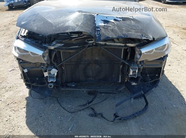 WBAJA7C50KWW07398 2019 BMW 5 SERIES Black Vista frontal