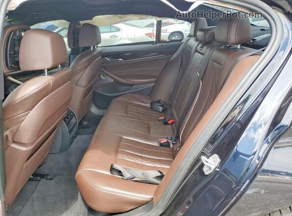 WBAJB9C53JG464593 2018 BMW M5 Blue Vista de los asientos traseros