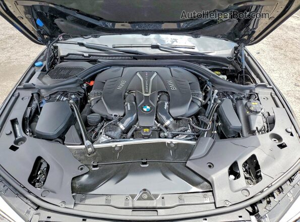 WBAJB9C53JG464593 2018 BMW M5 Blue Vista interior trasera