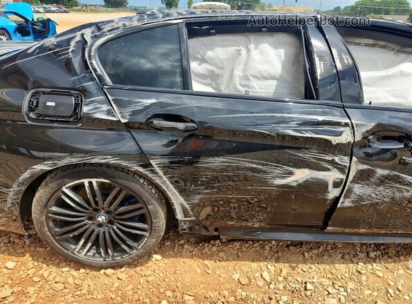 WBAJB9C54KB287745 2019 BMW M5 Black Հետևի նստատեղերի տեսք
