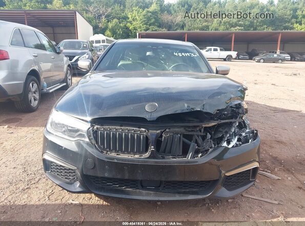 WBAJB9C56JG464040 2018 BMW 5 SERIES Черный Вид задней части салона