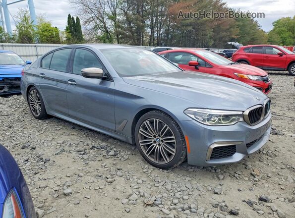 WBAJB9C58JB035026 2018 BMW M5 Серый Передняя правая четверть