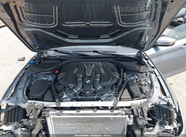 WBAJB9C5XJB036193 2018 BMW 5 SERIES Gray Widok z tyłu
