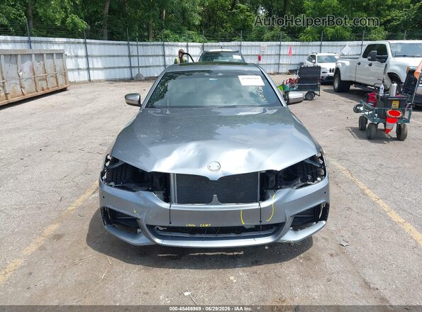 WBAJB9C5XJB036193 2018 BMW 5 SERIES Gray Widok wnętrza z tyłu