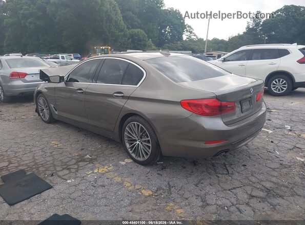 WBAJE5C36HG914102 2017 BMW 5 SERIES Beige Trasero izquierdo