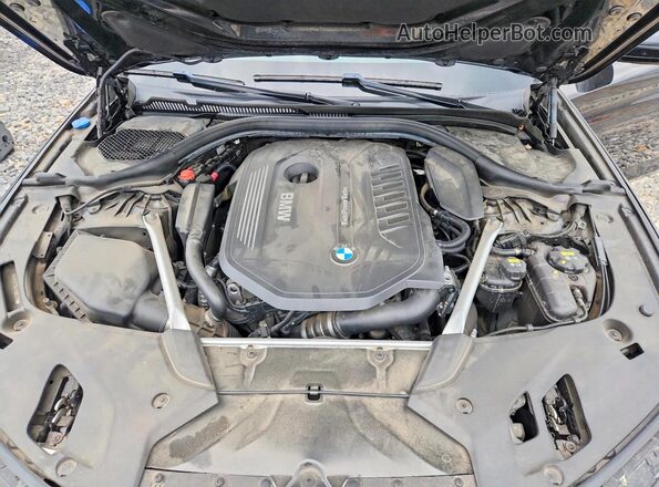 WBAJE7C54JG892376 2018 BMW 5 SERIES Black Rear interior view