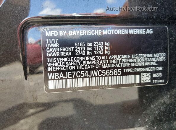 WBAJE7C54JWC56565 2018 BMW 5 SERIES Brown Engine compartment view