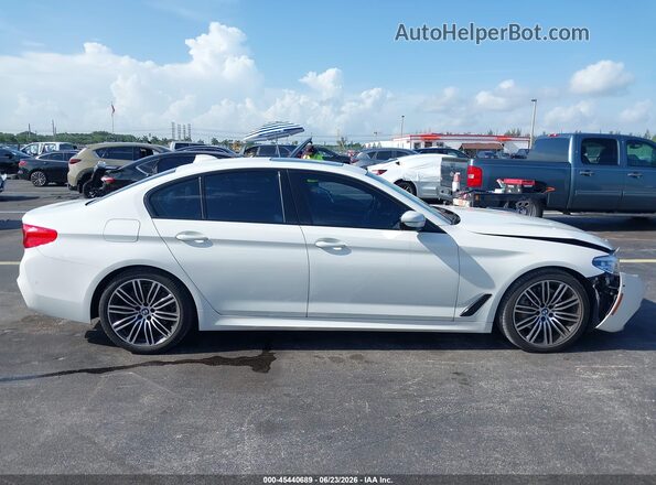 WBAJE7C55KWW14917 2019 BMW 5 SERIES White Rear interior view