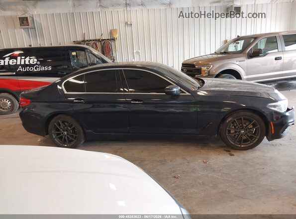WBAJE7C57JWC54924 2018 BMW 5 SERIES Blue Vista interior trasera