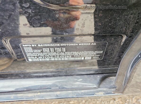 WBAJR7C04LCE45262 2020 BMW 5 SERIES Black Vista del compartimento del motor