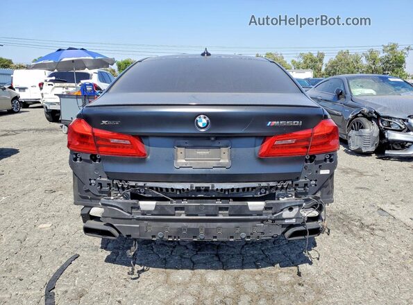 WBAJS7C03LCD44153 2020 BMW M5 Black Widok z tyłu