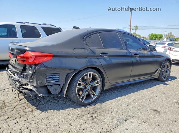 WBAJS7C03LCD44153 2020 BMW M5 Black Tył prawy