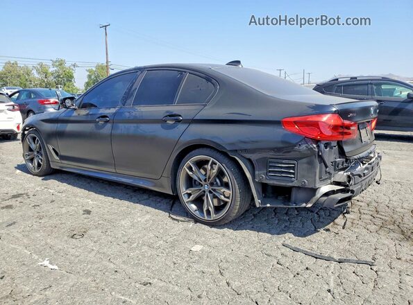 WBAJS7C03LCD44153 2020 BMW M5 Black Tył lewy