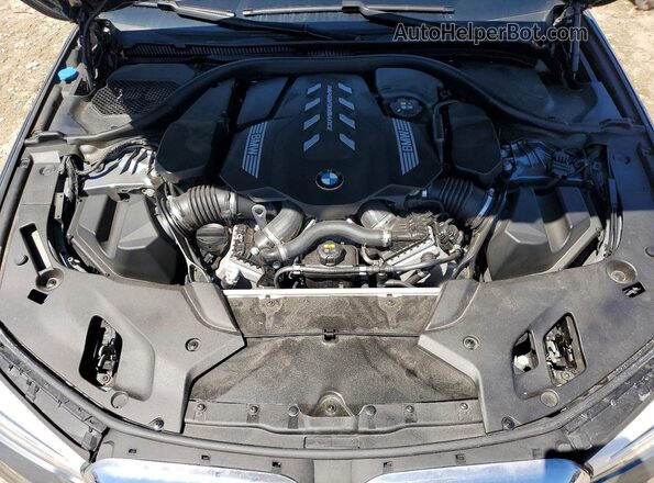 WBAJS7C05LCD47524 2020 BMW M5 Gray Vista interior trasera