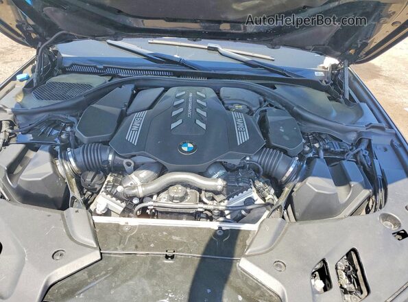 WBAJS7C05LCD53856 2020 BMW M5 Black Вид задньої частини салону