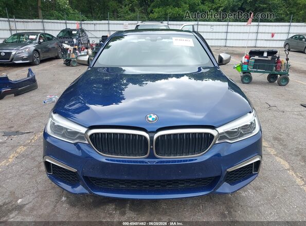 WBAJS7C08LCD08748 2020 BMW 5 SERIES Blue Սալոնի հետևի տեսք