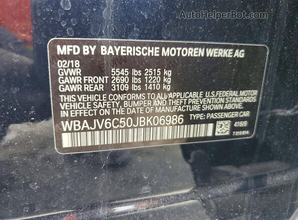 WBAJV6C50JBK06986 2018 BMW 7 SERIES Black 