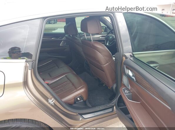 WBAJV6C59JBC99557 2018 BMW 6 SERIES Brown Widok naklejki z numerem VIN