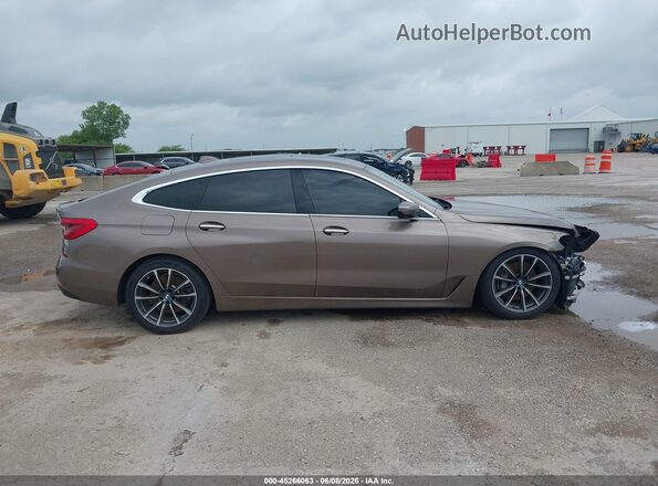 WBAJV6C59JBC99557 2018 BMW 6 SERIES Brown Widok wnętrza z tyłu