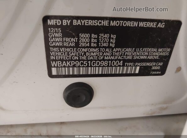 WBAKP9C51GD981004 2016 BMW 5 SERIES White Engine compartment view