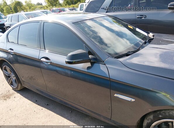 WBAKP9C56GG587674 2016 BMW 5 SERIES Gray უკანა სალონის ხედი