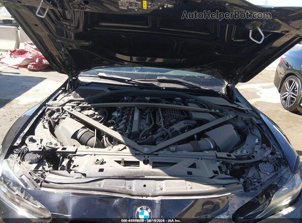 WBS33BA07RCN61394 2024 BMW M4 Black Հետևի տեսք