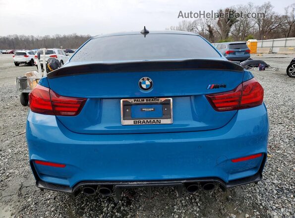 WBS4Y9C08LFJ30239 2020 BMW M4 Teal Vista trasera