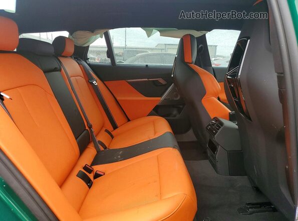 WBS83GV00TCW64029 2026 BMW M5 Green Rear seats view