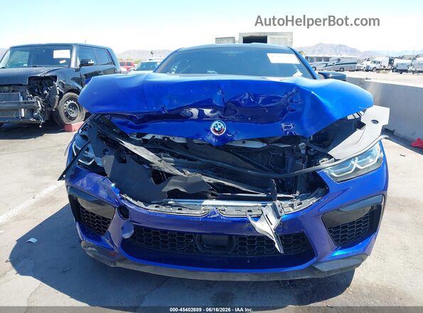 WBSAE0C02PCM46038 2023 BMW M8 Blue Առջևի վահանակի տեսք