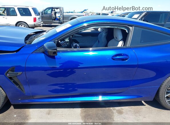 WBSAE0C02PCM46038 2023 BMW M8 Blue Սալոնի հետևի տեսք