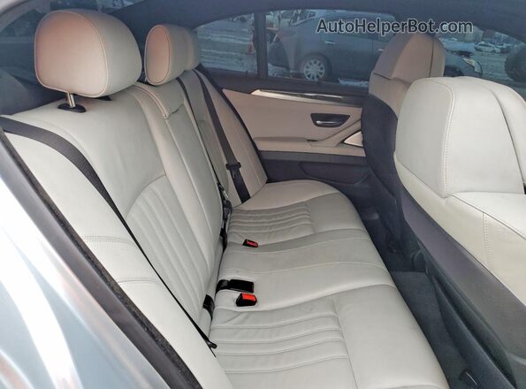 WBSFV9C58GG343480 2016 BMW M5 Turquoise Vista de los asientos traseros