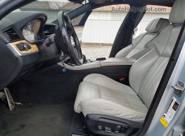 WBSFV9C58GG343480 2016 BMW M5 Turquoise Vista interior delantera