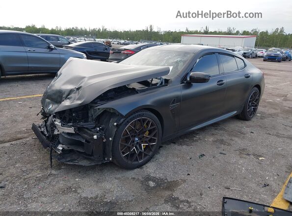 WBSGV0C04RCP30509 2024 BMW M8 Black Vista tres cuartos delantera izquierda