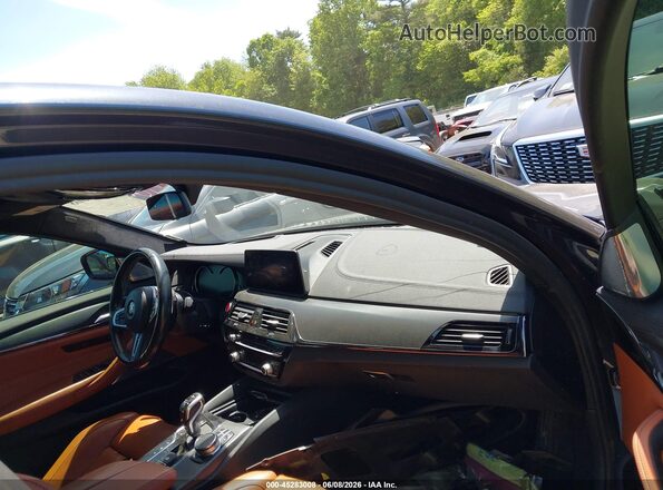 WBSJF0C56KB285507 2019 BMW M5 Gray Front interior view