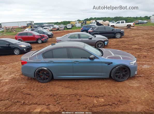 WBSJF0C59JB283152 2018 BMW M5 Blue Rear interior view
