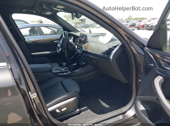 WBX47DP00NN173766 2022 BMW X3 Brown Vista interior delantera