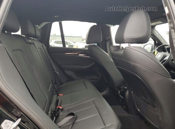 WBX47DP09RN316087 2024 BMW X3 Black Vista interior trasera