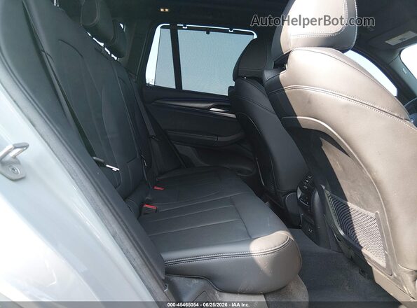 WBX57DP00NN142859 2022 BMW X3 Blue Widok naklejki z numerem VIN